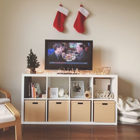 Our TV stand/cube organizers is my favorite part of our apartment 😍 organizer and boxes from Ikea Tv Stand Cube, Apartment Tv Stand, Studio Apartment Organization, Organize Tv Stand, Diy Cube Storage, Bedroom Tv Stand, Tv Stand Shelves, Small Tv, Tv Stand Decor