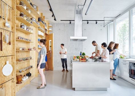 Parisian cooking classroom tools pack away onto plywood wall Cooking School Kitchen, Kitchen Workshop, Plywood Wall, Cooking In The Classroom, Plywood Storage, Kitchen Studio, Plywood Walls, Workshop Studio, Activity Room