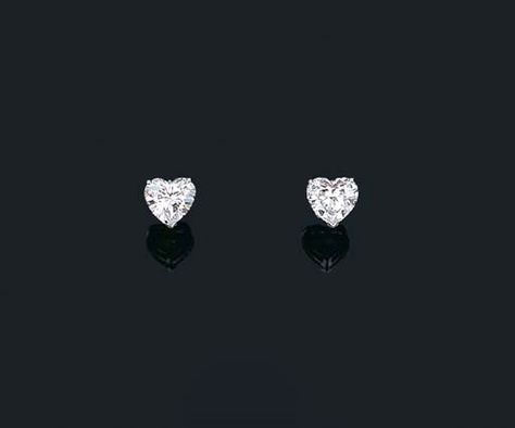 A PAIR OF DIAMOND EAR STUDS Price realised HKD 1,614,100 Estimate HKD 1,150,000 - HKD 1,240,000 Closed:  29 Apr 2002 Each set with a heart-shaped diamond weighing 3.26 and 3.58 carats, mounted in platinum Heart Shaped Diamond Earrings, Diamond Ear Studs, Heart Diamond Earrings, Diamond Heart Earrings, Luxurious Lifestyle, Heart Shaped Earrings, Heart Shaped Diamond, Body Chain Jewelry, Chain Jewelry