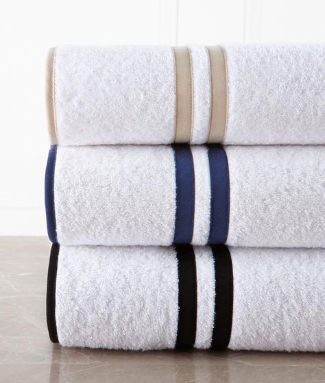 Kensington II Bath Towels by Legacy Home. Luxurious, soft and plush terry towels featuring contrasting tape trim and a double tape border. Classic and bold, this collection of bath linens is sure to make a statement in any modern bathroom. Towels are available in White and Ivory with over 50 tape color options. 100% Cotton - 600 gms Bath towel, hand towel and guest towel have double tape border and tape trim Washcloth has tape trim edge only Fabric Origin: Italy Made in the USA Bathroom Towels Display Hanging, Bathroom Hand Towels Display, Towel Rack Display, Bathroom Towel Decor Ideas, Bathroom Towels Display, Modern Trim, Bathroom Towel Decor, White Bath Towels, White Hand Towels