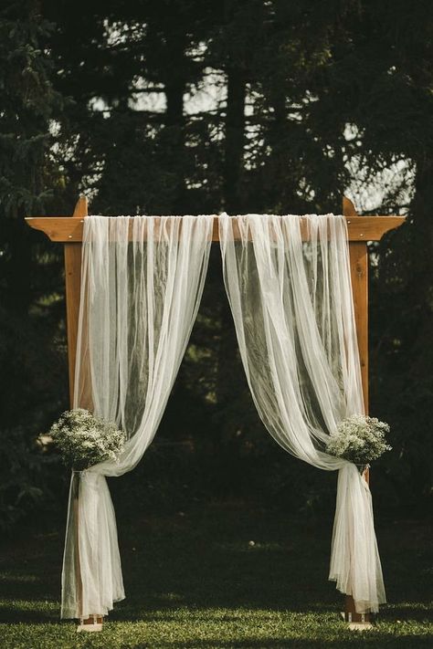 Easy Wedding Ceremony Decor, Small Wedding Altar Ideas, Pergola Wedding Arch Decor, Wedding Arch Sheer Curtain, Ceremony Arbor Greenery, Wedding Arches Greenery, Simple Arch For Wedding Ceremony, Outdoor Ceremony Simple Decor, Wedding Arch With Curtains