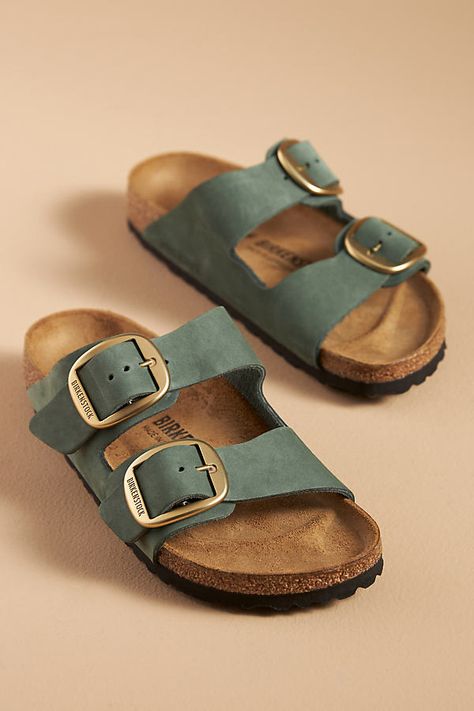 The iconic Arizona sandal features two adjustable straps and a cork footbed for unsurpassed comfort and timeless style. You’re a shoe -in for incredible style and comfort when you slip on Birkenstock®. (P.S. it’s our favorite step when putting together an OOTD)! | Arizona Big Buckle Nubuck Sandals by Birkenstock in Green, Women's, Size: 36, Leather/Metal/EVA at Anthropologie Arizona Travel Outfits, Birkenstock Arizona Big Buckle, Arizona Big Buckle, Frock And Frill, Mum Fashion, Comfort Shoes Women, Aesthetic Shoes, Birkenstock Arizona, Birkenstock Shoes