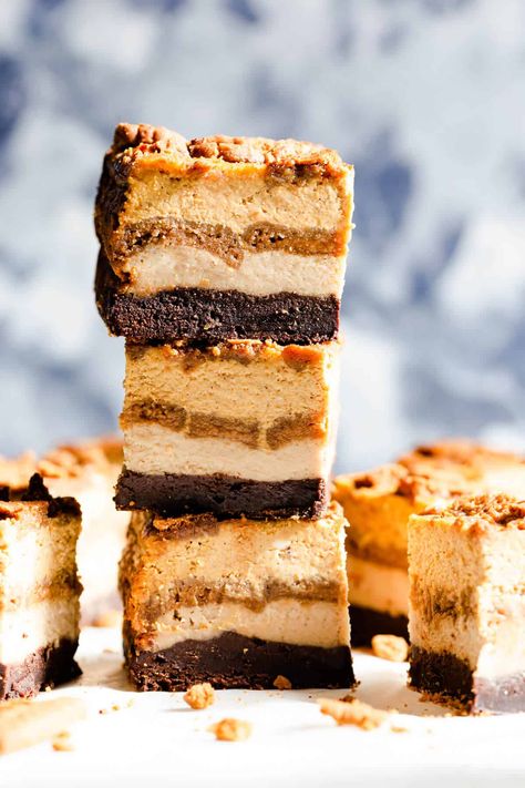 Discover these irresistible pumpkin biscoff cheesecake brownie bars from Anna Banana! The creamiest and most decadent treat for this autumn! Made with layers of rich brownie, biscoff cheesecake & biscuits and creamy pumpkin cheesecake layer #pumpkin #dessert Pumpkin Biscoff, Pumpkin Granola Bars, Cheesecake Brownie Bars, Cheesecake Layer, Brownie Bars, Cheesecake Brownie, Biscoff Cheesecake, Pumpkin Cheesecake Recipes, Anna Banana