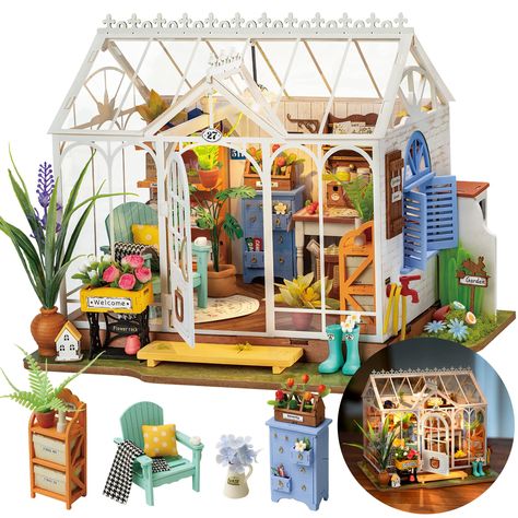 PRICES MAY VARY. 💐【NICE DIOROMA KIT】All the furniture and accessories are almost the same as a real garden house with similar materials. So cute and beautiful. Drawing board, window, curtain, desk, shelf, and plants are included. 1:24 scale, unfinished kit. Colorful Instruction, each step has pictures to show you how to assemble. 💐【DIY CRAFT KIT】If you are a DIY craft lover, it's definitely the best gift for yourself. Much better to say to create a masterpiece during the process to finish this Tiny House Kits, Diy Buch, Dreamy Garden, Elegant Doors, Flower House, Flower Chandelier, Diy Greenhouse, Elizabeth Craft Designs, Plastic Wood