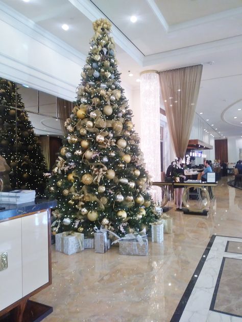 Christmas @The Trump hotel lobby, Las Vegas, NV, in 2018 by MyFloriculture Christmas Tree Hotel Lobby, Christmas Decor Hotel Lobby, Hotel Holiday Decor, Hotel Christmas Decorations Lobbies, Christmas Hotel Lobby, Hotel Christmas Decorations, Hotel Christmas Tree, Lobby Christmas Decor, Commercial Holiday Decor