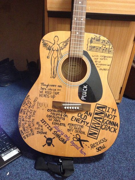 Music Supremacy, Guitar Deco, Guitars Aesthetic, Lyrics Nirvana, Ukulele Designs, Nirvana Guitar, Nirvana Lyrics, Guitar Decorations, Acoustic Guitar Art