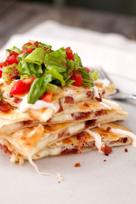 Apr 6, 2017 - BLT Quesadillas filled with crispy bacon and spicy cheese and topped with a fresh tomato salad. A delicious twist on the classic Tex-Mex quesadilla. Best Quesadilla Recipe, Blt Recipes, Quesadilla Maker, Chili Relleno, Spicy Cheese, Quesadilla Recipes, Quesadillas, Mexican Dishes, Fajitas