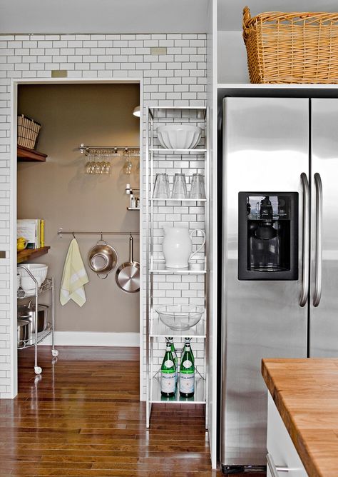 kitchen-rack-near-fridge-subway-tile-69fd85f1 Baskets Above Fridge, Above Fridge, Pegboard Kitchen, Decorating Above Kitchen Cabinets, Budget Remodel, Casa Loft, Kitchen Storage Space, Small Kitchen Decor, Small Space Solutions