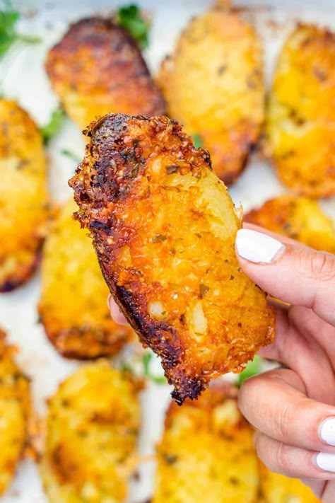 These Parmesan Crusted Potatoes will be your new favorite way to eat potatoes. They are golden and crispy and taste like perfection! Crispy Parmesan Potato Bites, Crispy Parmesan Potato Chips, Parmasean Crusted Potato, Crispy Parmesan Crusted Potatoes, Crispy Wedges, Tasty Potato Recipes, Crusted Potatoes, Crispy Parmesan Potatoes, Parmesan Crusted Potatoes