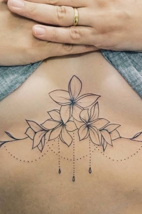 45 Sexy Underboob Tattoos You’ll Want to Get ASAP Underbreast Tattoo, Underboob Tattoos, Chandelier Tattoo, Underboob Tattoo Designs, Underboob Tattoo, Cool Chest Tattoos, Small Tattoos Simple, Chest Tattoos For Women, Lace Tattoo