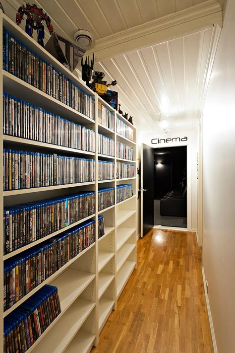 Blu-ray shelves...but I'd make it a LIBRARY!!  and right beside a theater room...I wish this is at my house Sala Cinema, Movie Theater Rooms, Movie Room Decor, Home Cinema Room, At Home Movie Theater, Urban Interiors, Home Theater Rooms, Home Theater Design, Theatre Room