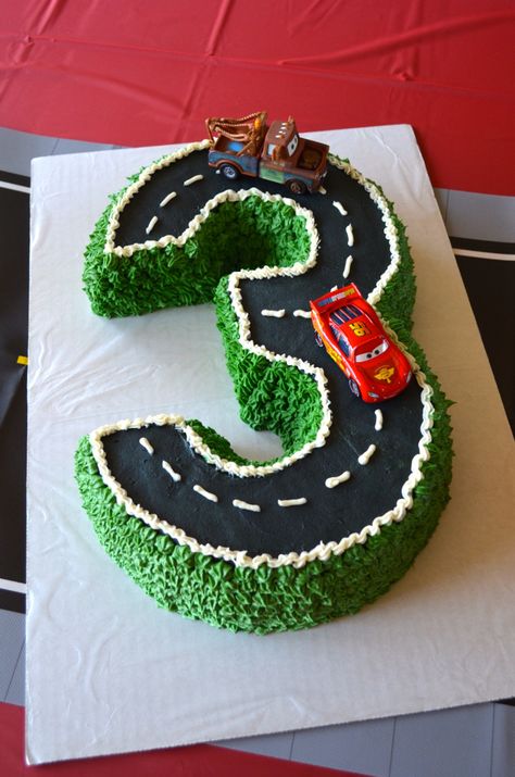 Cake for Disney Pixar Cars/Lightning McQueen third birthday party. Made with two Bundt cakes cut to shape the number 3. 4 Year Boy Birthday Cake, 4 Year Birthday Cake For Boys, Cakes For 4 Year Boy, Birthday Theme For 4 Year Boy, Cake For 4 Year Boy, Birthday Cake For 4 Year Boy, Lightning Mcqueen Party, Auto Party, Pixar Cars Birthday