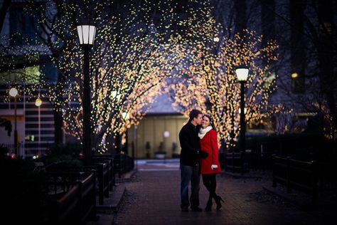 Photography: Cristina G Photography - cristinagphoto.com  Read More: http://www.stylemepretty.com/2012/12/24/chicago-christmas-engagement-session-from-cristina-g-photography/ Christmas Lights Photoshoot, Christmas Engagement Photos, Christmas Couple Pictures, Chicago Christmas, Winter Engagement Pictures, Pictures Engagement, Christmas Shoot, Christmas Engagement, Country Engagement