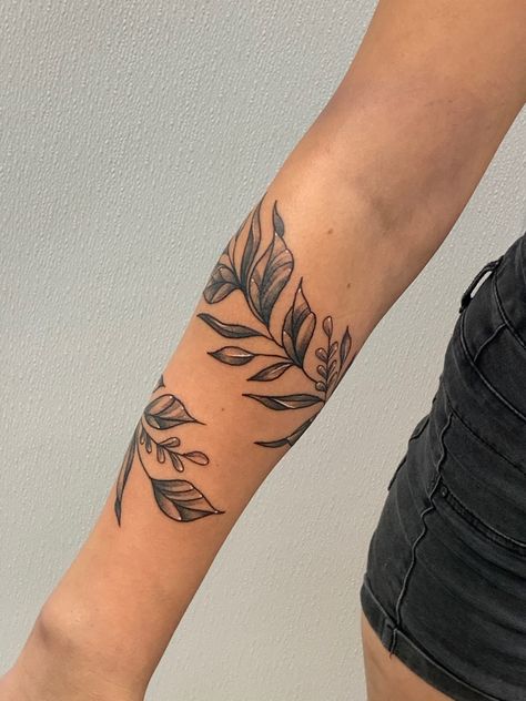 Leafs, wrap tattoo, arm tattoo, girl tattoo, wrist tattoo, black and white tattoo, floral tattoo Black And White Wrist Tattoo, Leave Around Arm Tattoo, Leave Tattoo Arm, Leaf Arm Tattoos For Women, Wrap Tattoo Wrist, Leaf Arm Band Tattoo, Leaves Around Arm Tattoo, Leaves Wrist Tattoo, Leaf Tattoo Wrist