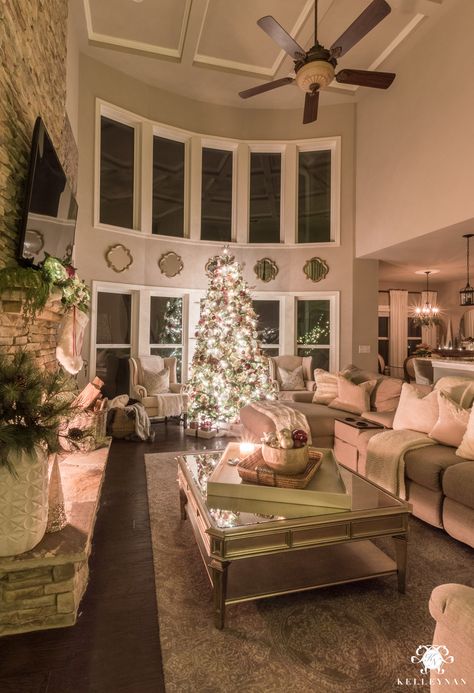 Two story living room with bay window and huge christmas tree #christmasgreatroom #christmaslivingroom #twostorylivingroom #cofferedceiling #bowofwindows #twostorydecor Living Room With Bay Window, Two Story Living Room, Huge Christmas Tree, Room With Bay Window, Bay Window Living Room, Lighting Tips, Christmas Decorations Living Room, Christmas Living Rooms, Christmas Room