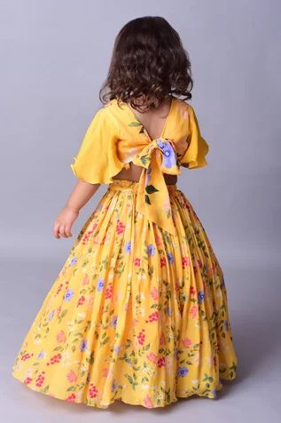 Shop for Ba Ba Baby clothing co Yellow Sunshine Bloom Printed Lehenga Set For Girls Online at Aza Fashions Chaniya Choli For Baby Girl, Organza Lehenga For Kids, Lehenga For Baby Girl, Pattu Pavada, Baby Lehenga, Salwar Neck Designs, Kids Ethnic Wear, Lehenga Pattern, Printed Lehenga