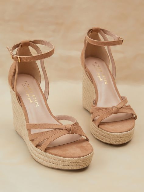 The best way to bring a boho, beach vibe to all your favorite looks. Strut in style down the boardwalk with the espadrille-style jute around the wedge and braided knot up top. We love pairing this shoe with a flowing maxi dress or shorts for the warm summer weather. Cute Wedges Shoes, Beach Wedges Shoes, Boho Wedges, Summer Shoes Wedges, Beige Wedges, Vacation Shoes, Boho Shoes, Cute Wedges, Espadrilles Style