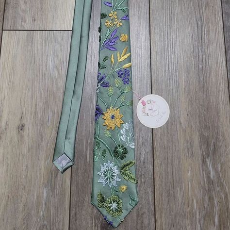 FLORAL TIES 🌿 Abby found my Lennox Ties on Etsy and asked if I could make one to match the lace on her wedding dress. I had this floral lace in my inventory a while back, so I knew immediately that we could make her vision come to life. The lace comes on a green tulle, which blends perfectly with my sage satin tie. 👌 https://lavoilerose.etsy.com #neckties #custom #handmade #veils #sewing #floral #wedding ##brideandgroom #style #etsy #embroidery Tie Embroidery, Floral Ties, Kutch Embroidery, Etsy Embroidery, Floral Veil, Secret Closet, Embroidered Tie, Flower Tie, Collection Ideas