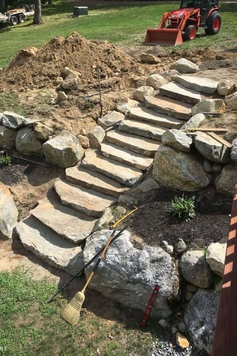 Natural stone steps installed. Natural Stone Steps, Entryway Landscaping, Lake Landscaping, Sloped Backyard Landscaping, Landscaping On A Hill, Stone Landscaping, Sloped Backyard, Stone Steps, Landscaping Retaining Walls