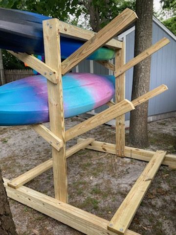 Homemade Kayak Stand for 4 kayaks Kayak Stands Diy, Homemade Kayak, Diy Kayak Rack, Kayak Holder, Kayak Stand, Kayak Storage Rack, Storage Outdoor, Kayak Storage, Shed Organization