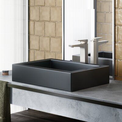 Sleek and contemporary, the Voltaire Ceramic Rectangular Vessel Bathroom Sink features a fresh look for classic white ceramic, in a true minimalist fashion. Striking simple style, while maximizing precious bathroom space, makes above-counter sinks popular for powder rooms. Features smooth baked-on glaze, and non-porous high-gloss finish, for durable scratch-resistant and easy to clean convenience. Sink Finish: Black | Swiss Madison Voltaire Ceramic Rectangular Vessel Bathroom Sink in Black, Size Black Vessel Sink Bathroom, Black Bathrooms, Above Counter Bathroom Sink, Bathroom Main, Rectangular Vessel Sink, Wall Mounted Bathroom Sinks, Drain Opener, Vessel Faucets, Undermount Bathroom Sink