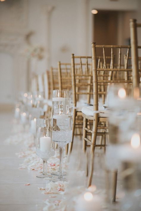 Wedding Ceremony Decor | Gold Chiavari Chairs | Blush Rose Petals | Candlelit Wedding Aisle | White Candles | Venus: Chateau Cocomar | Houston Wedding | Photographer: M. Wang Photography Champagne Wedding Ceremony, Wedding Ceremony Candles, Champagne Wedding Theme Ceremony Decor, Candlelit Wedding Aisle, Champagne At Wedding Ceremony, Wedding Isle Candles, Gold Wedding Chairs Ceremony, Floating Candle Aisle, Candle Lit Ceremony Aisle