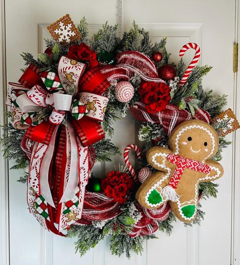 If you're seeking a traditional Christmas wreath to adorn your front door, this red, white, and green design is ideal. A Gingerbread Man wreath is also a great choice for festive decor. This shiny, glittery wreath will make a stunning statement on your door for years to come. Traditional Christmas colors evoke a warm, festive atmosphere. I personally prefer classic red and green for my holiday decor. This Gingerbread Man wreath will be a perfect choice to greet guests for many Christmases. My de Christmas Wreaths On Doors, Gingerbread Christmas Wreaths, Red And Green Wreath, Christmas Wreaths For Front Door Diy, Gingerbread Wreaths Christmas, Wreath Decorating Ideas Christmas, Xmas Wreaths For Front Door, Christmas Wreath Decorating Ideas, Birthday Wreath Diy