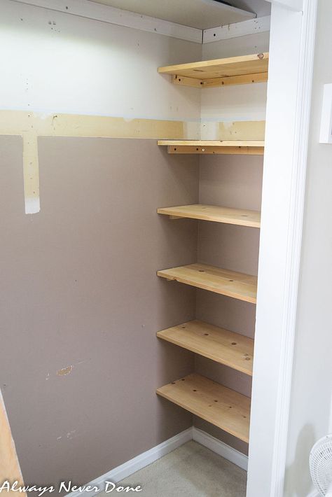 Make the most out of small closet spaces by adding shelving into 'dead spaces' on the sides of the closet space. This would be great for storing handbags. Tip use tension rods instead. Small Master Closet, Cheap Closet, Closet Small Bedroom, Front Closet, Ideas Closet, Small Closet Space, Tiny Closet, Small Closets, Closet Remodel