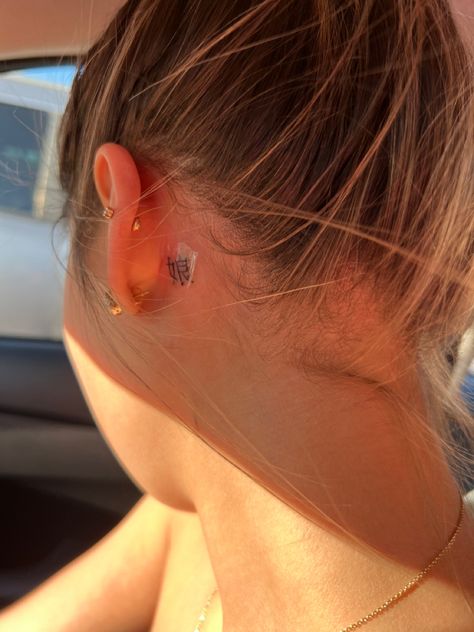 Fineline Tattoo Behind Ear, Stick And Poke Tattoo Behind Ear, Om Tattoo Behind Ear, Ear Back Tattoo, Chinese Tattoo Behind Ear, Chinese Tattoos Behind Ear, Behind The Ear Tats, Theatre Tattoo, Back Ear Tattoo