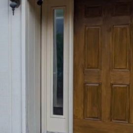 Chelsea on Instagram: "The finale look of my front door makeover. I'm really happy with how this turns out. How I achieved this faux wood look: I started with a base coat in a creamy yellow. Then I applied two coats of Varathane gel stain in the color golden oak. Make sure to let the first coat dry completely before applying the next. It's such a big transformation and so satisfying! I'll be working on the garage doors next, you don't want to miss it. #fauxwood #fauxwooddoor #frontdoor #frontdoormakeover #beforeandafterhome #entrydoor #doorproject #homediy #diyhomeprojects" Front Door Makeover, Front Door Colors, So Satisfying, Gel Stain, Golden Oak, Door Makeover, Door Color, The Garage, Base Coat