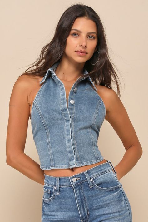 The Lulus Sensational Trend Light Wash Denim Collared Backless Crop Top is exactly what you need to be a stylish icon wherever you go! Slightly stretchy, cotton-blend denim shapes this must-have top that features a halter-inspired, collared neckline and a sleeveless, princess-seamed bodice. The cropped silhouette features a hidden, functional button placket at the center and a wide, elasticized strap at the hem that crosses the otherwise open back. Fit: This garment fits true to size. Bust: Grea Denim Tops Women, Halter Neck Top Pattern, Bridal Makeup Red Lips, Western Tops For Women, Jeans Crop Top, Denim Upcycle, Denim Top Women, Embroidery Blouses, Crop Top With Jeans