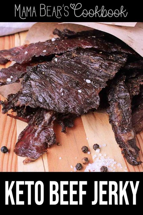 Not just your average dried meat, this delicious Keto Beef Jerky is sugar free, smokey, chewy, salty and totally easy to make at home! Perfect for road trips or easy keto friendly snacking! #keto #lowcarb #sugarfree #meat #jerky #mamabearscookbook Sugar Free Beef Jerky Recipe, Keto Jerky Recipe, Keto Beef Jerky Recipe, Jerky Marinade Recipes, Beef Jerky Recipe Dehydrator, Beef Jerky Marinade, Homemade Beef Jerky Recipe, Jerky Recipes Dehydrator, Jerkey Recipes