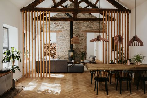 The original features have been preserved with the original brickwork and beams left exposed. The vertical timber is a great way to zone the kitchen area too. Barn Conversion Interiors, London Interior Design, Barn Kitchen, Barn Interior, Barn Renovation, House Essentials, Shaker Style Kitchens, Barn Conversion, Barn Style House