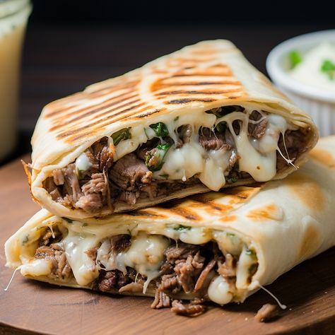 A delicious and easy-to-make grilled wrap filled with all the flavors of a Philly Cheesesteak sandwich. Cheesesteak Wrap Philly, Steak And Cheese Wraps, Cheesesteak Wrap, Steak Wraps Recipes, Cheesesteak Sandwich, Steak Wraps, Beef Wraps, Cheese Steak Sandwich, Easy Steak