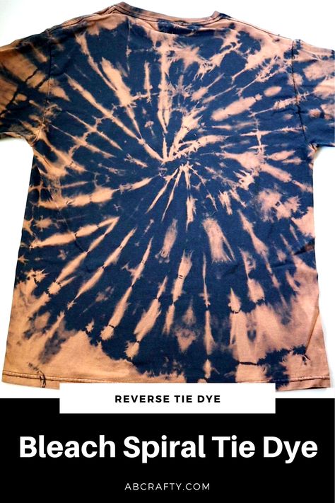 lack and orange spiral reverse tie dye t shirt with the title "bleach spiral tie dye" Spiral Bleach Tie Dye, Ways To Bleach Shirts, Tie Dye Bleach Shirt, Tie Dye Colored Shirts, How To Bleach Tie Dye, Bleach Tie Dye Diy Patterns, Bleach Tie Dye Diy, Reverse Tie Dye With Bleach, Tie Dye With Bleach