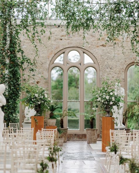 Natural floral arrangements in & by the team at @killruddery leaf 🌿 These pedestals, hanging greenery & pew ends made The Orangery feel like you were surrounded by nature 💚 @michellepruntyphotography @waterlily_weddings_ Pew Florals, Natural Floral Arrangements, Orangery Wedding, Hanging Greenery, The Orangery, Pew Ends, Water Lilies, The Team, Floral Wedding