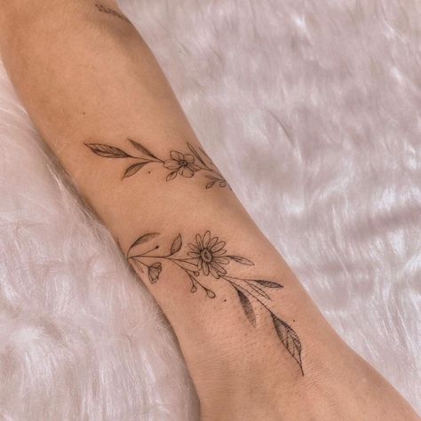 Floral Vine Wrist Tattoos For Women, Wrap Around Sunflower Wrist Tattoos, Dainty Forearm Wrap Around Tattoo, Vine Tattoo With Sunflower, Sunflower Vines Tattoo, Sunflower Tattoo With Vines, Sunflower Arm Wrap Tattoo, Sunflower Wrap Tattoo, Botanical Wrist Wrap Tattoo