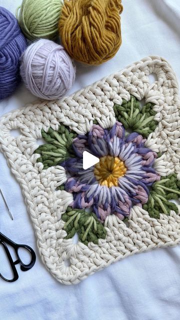 Caroline Langford - Floral Fiber Artist on Instagram: "Embroidery + crochet ✨  I’ve been wanting to experiment with embroidery in my work for a long time, and then I had the idea of combining it with a floral granny square - so here is my first attempt! I’ve already changed a couple things and I’m thinking about adding more, or possibly beads? I’m not sure yet, just taking it slow.  Thanks for all of your guesses about what this will be in the end - it’s going to be a wall hanging! 🤩  Love always, Caroline  #thehappyhomecollective #flowermacrame #floralmacrame #floralweaving #foreverflowers  #flowerweaving #handmadeisbest #etsyshop #crochetersofinstagram #floralgrannysquare #grannysquare #flowercrochet #processvideo #oddlysatsifying #flowerembroidery #paintingwithfiber" Chenille Granny Square, Floral Granny Square Crochet, Floral Granny Square, Taking It Slow, Háčkovaná Čipka, Volume Spray, Flower Granny Square, Embroidery Crochet, Blanket Ideas