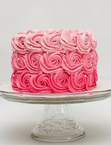 This cake is frosted in a rosette shape made with our whipped vanilla buttercream.  The colors get lighter as you get to the top and it is adorned with white pearl sprinkles. Bolo Blaze, Frosted Cake, Buckwheat Cake, Rosette Cake, Ricotta Cake, Cupcakes Decorados, Homemade Birthday, Savory Cakes, Zucchini Cake