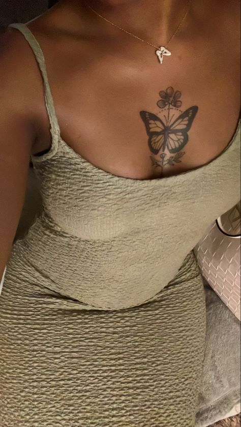 #tattooideas #butterflytattoo #tattoosforwomen #tattoo Girl Chest Tattoo Ideas For Women Black, Tattoos Black Women Dark Skin, Black Female Back Tattoos, Butterfly Tattoo Brown Skin, Tattoo For Dark Skin Women, Butterfly Between Breast Tattoo, Small Tattoos On Dark Skin, Tattoo Ideas On Chest For Women, Women Tattoos Chest