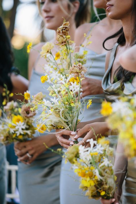 Delicate maids bouquets featuring tuberose, yellow oncidium orchids, brown lisianthus & stipa grass for a summer wedding at Hummingbird Nest Ranch. Yellow Wedding Bouquet Rustic, Mini Orchid Bouquet, Yellow Oncidium Orchids, Yellow Orchid Bouquet, Yellow Bridesmaid Bouquet, Yellow Lisianthus, Yellow Wedding Flowers Bouquet, Brown Lisianthus, Yellow Flowers Wedding