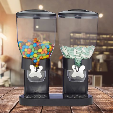 The oatmeal dispenser is the perfect storage for the breakfast cereals because there is room for 2 different types of muesli in the 2 large containers. With the wheel, the number of cornflakes can also be easily portioned. The Candy Dispenser with lid is also perfect as a sweets dispenser for sweets, chocolate lentils or nuts. The muesli dispenser hangs stable in the stand, is easy to remove and can be cleaned quickly with warm water. Colour: Black Sweets Chocolate, Wishlist Ideas, Cereal Dispenser, Candy Dispenser, Breakfast Cereal, The Breakfast, Water Colour, Popcorn Maker, Food Storage Containers