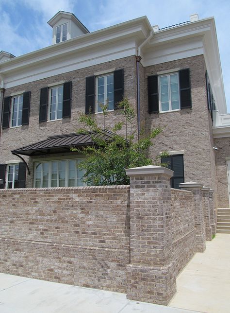 Building with brick can make a wall more than just a wall. Incorporate details like special shape brick coping and water tables to make it stand out. http://insistonbrick.com/ Brick Companies, South Alabama, Brick Detail, Water Tables, Cultured Stone, Brick Exterior House, Water Table, Brick Colors, Ranch House Plans