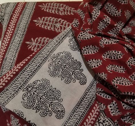 RED AND BLACK INTRICATE PAISLEY AND FLORAL HAND BLOCK PRINTED COTTON FABRIC WITH NATURAL DYES FROM ARTISANS IN INDIA Hand Block printing is a century-old Indian art form and a hand skill practice that involves a lot of hard work and the production process is painstaking and manual utilizing natural dyes and vegetable pastes. In the making of this printed fabric, a hand-carved teak wood block is dipped in plant extracted dyes in black and red and stamped by hand onto the soft cotton fabric. Craft Hand Carved Teak, Printed Cotton Fabric, Plant Dyes, Cotton Tablecloths, Floral Vine, Block Printing Fabric, Block Printing, Naturally Dyed, Indian Art