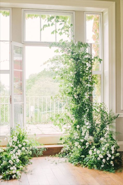 A deconstructed foliage archway with delicate white flowers created in a natural style Foliage Wedding Decor, Natural Wedding Flowers, Flowers Display, Green Wedding Decorations, Timeless Bride, White Wedding Arch, Summer Wedding Ceremony, Floral Arch Wedding, Green Wedding Flowers