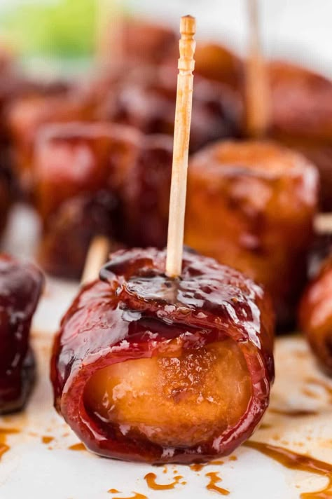 Bacon-Wrapped Water Chestnuts - Everyone goes NUTS over this easy appetizer. Whole water chestnuts are wrapped in bacon and marinated in a sweet/savory sauce. Water Chestnuts Wrapped In Bacon, Bacon Wrapped Water Chestnuts Recipe, Thanksgiving Apps, Bacon Wrapped Water Chestnuts, Chestnut Recipes, Boxed Cake Mixes Recipes, Cherry Sauce, Classic Appetizers, Wrapped In Bacon