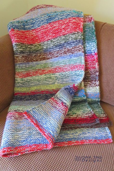 Leftover balls of yarn project complete – a blanket! – Oak Tag Designs Leftover Yarn Projects Knitting, Leftover Yarn Projects, Raverly Patterns, Leftover Yarn Project, Knitting Projects Blanket, Knit Afghan Patterns, Knitted Blanket Squares, Yarn Project, Balls Of Yarn