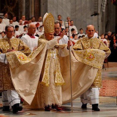 The Pope, wearing a fabulous vintage chiffon-lined Dior gold lame gown  over a silk Vera Wang empire waist tulle cocktail dress, accessorized with a three-foot House of Whoville hat and  the ruby slippers Judy Garland wore in the Wizard of Oz, on his way to tell us it's Wrong to be Gay. Tulle Cocktail Dress, Pope Benedict Xvi, Pope Benedict, Ruby Slippers, The Pope, Holy Father, Roman Catholic Church, Pope Francis, Roman Catholic