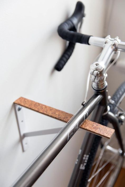 Shelf Brackets - New Creative Uses | Apartment Therapy Bike Storage Inside, Bike Storage Apartment, Indoor Bike Storage, Diy Bike Rack, Bike Shelf, Bike Storage Solutions, Bike Hooks, Bike Hanger, Bike Storage Rack