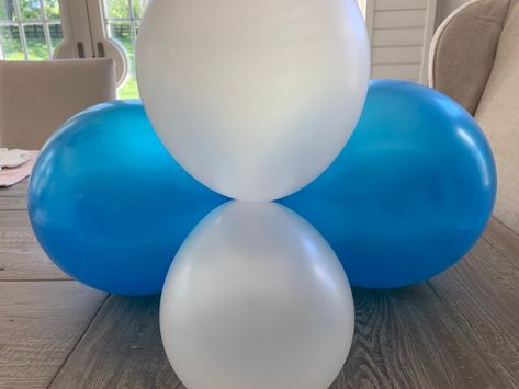 How to Make a Balloon Banner, Balloon Backdrop, or Balloon Garland - Happy Haute Home Tying Balloons Together, How To Tie Balloons Together, Tie Balloons Together, 80 Birthday, Bacon And Asparagus, Creamy Chicken Spaghetti, Blowing Up Balloons, Balloon Garland Diy, Round Balloons